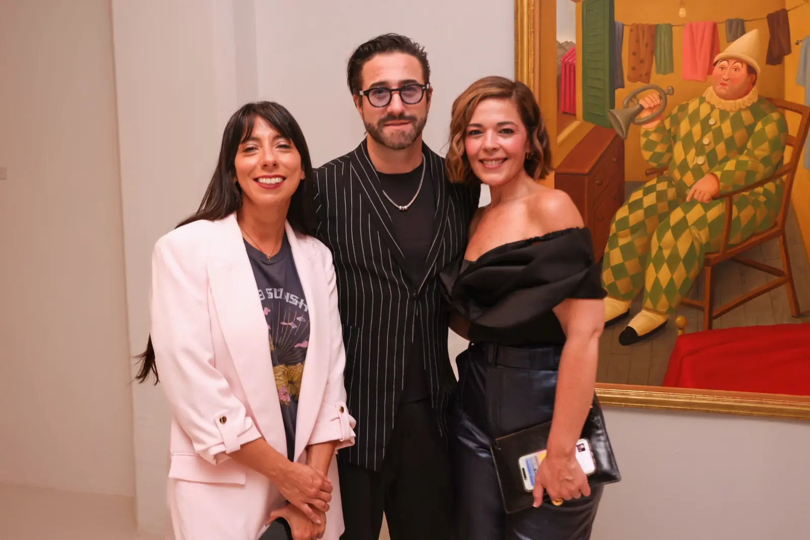 Ana Viola, Mariano Chiesa and María Carolina Alonso at the Botero & Music opening.