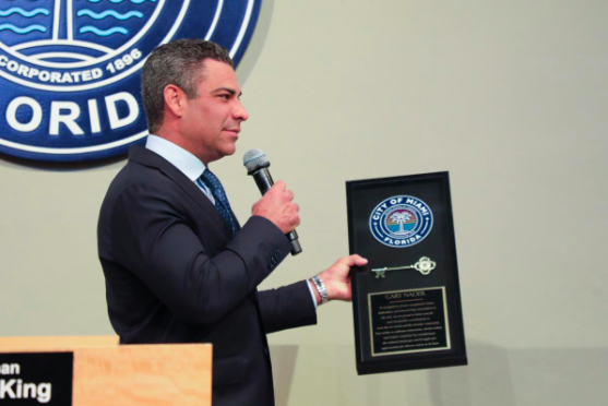 Mayor Francis Suarez presents the Key to the City of Miami honoring Gary Nader.