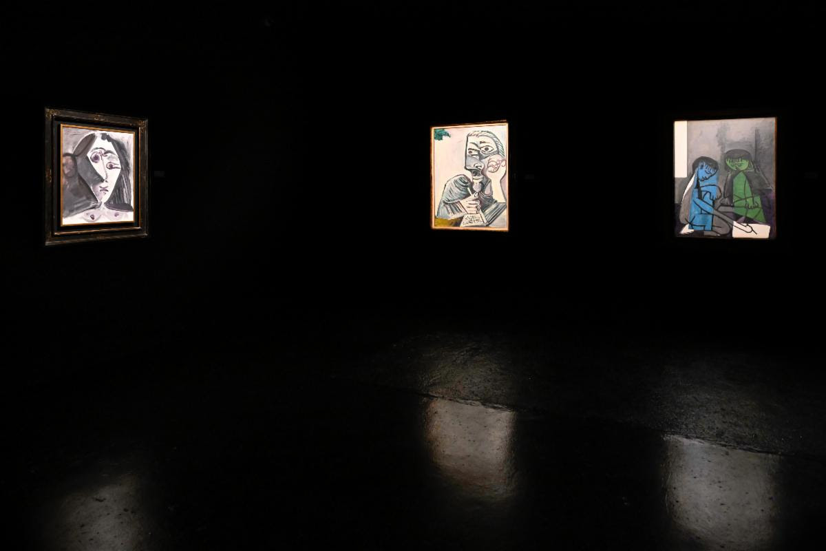 Picasso paintings displayed on dark gallery walls at Gary Nader Art Centre.