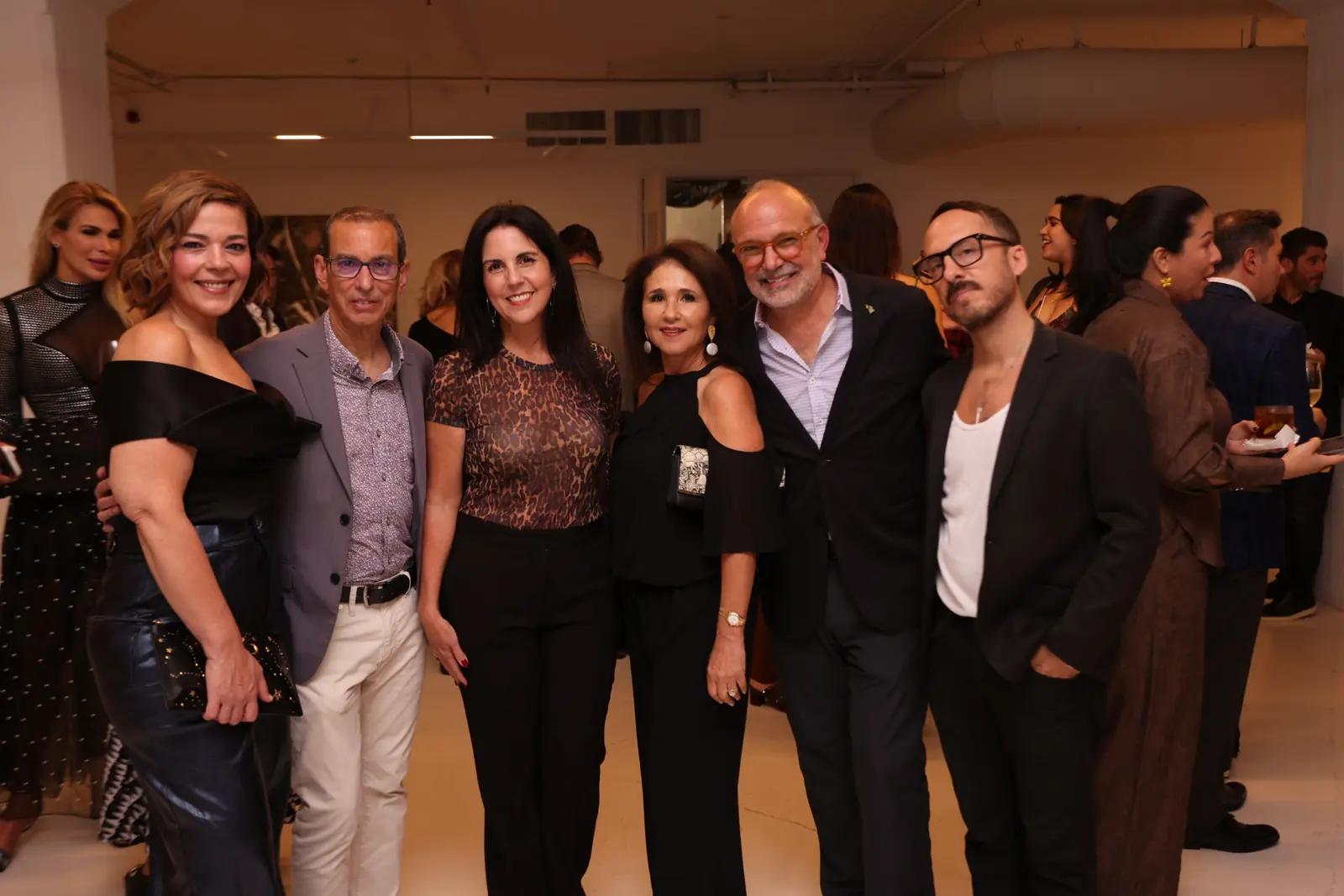 María Carolina Alonso, Enrique Perez, Ayleen Figueras, Angelica Abud, Manuel Abud and Mario Garibaldi at the opening.