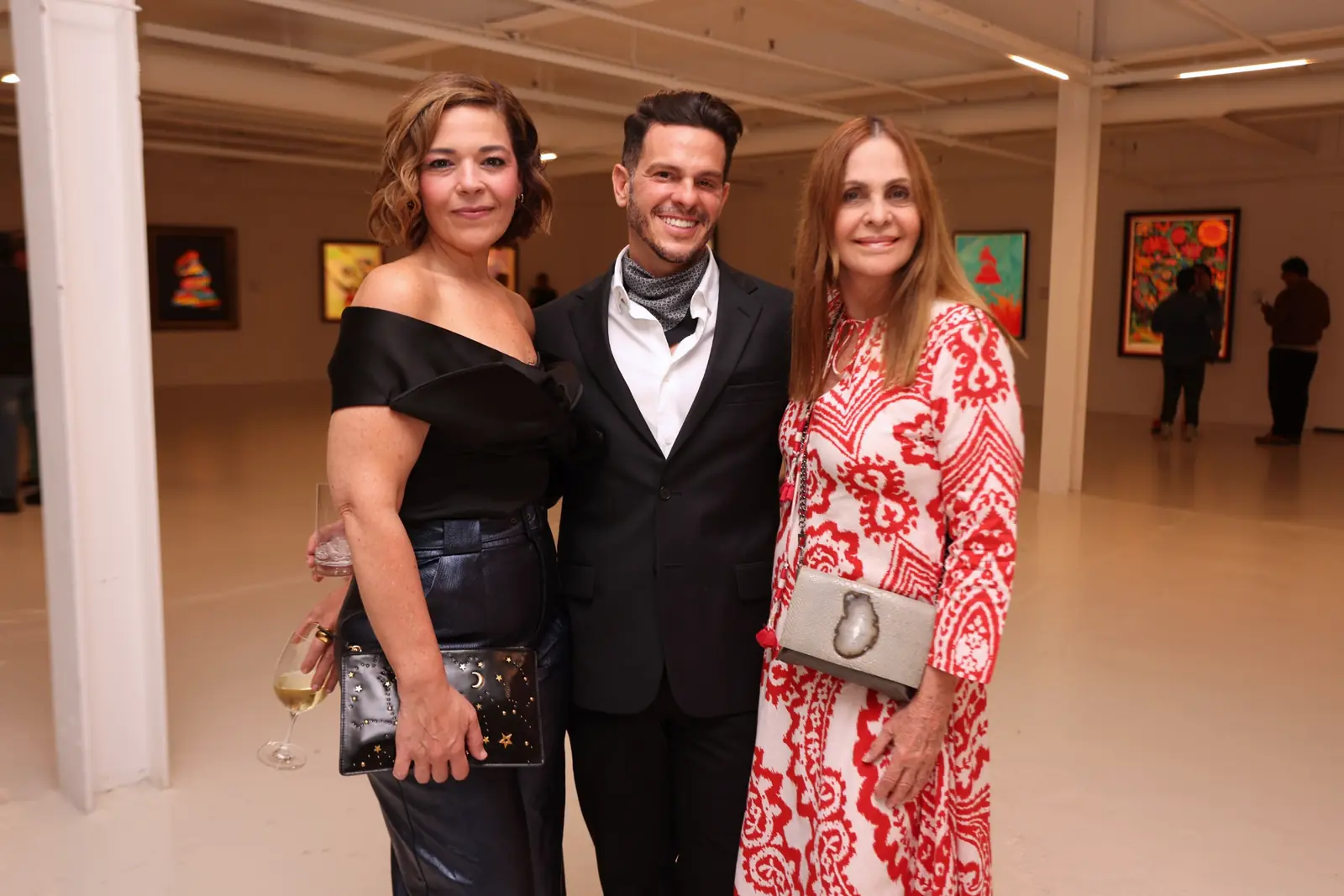 María Carolina Alonso, Gerardo Suarez and Ingrid Ribiero at the Botero & Music opening.