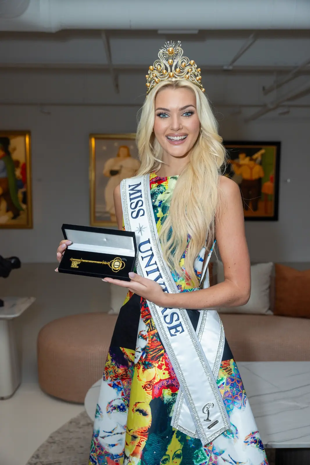 Miss Universe 2024 Victoria Kjær Theilvig holding the ceremonial key at Gary Nader Art Centre.