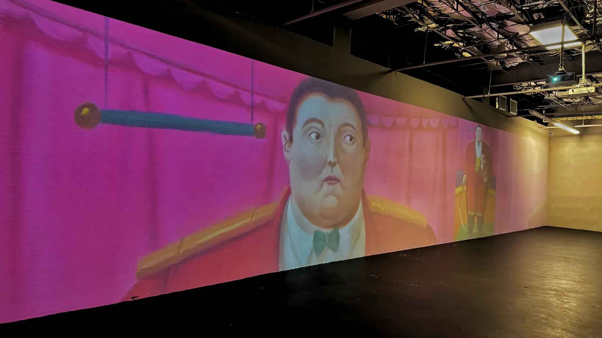 Circus imagery by Fernando Botero projected across the Botero Immersed installation in Miami