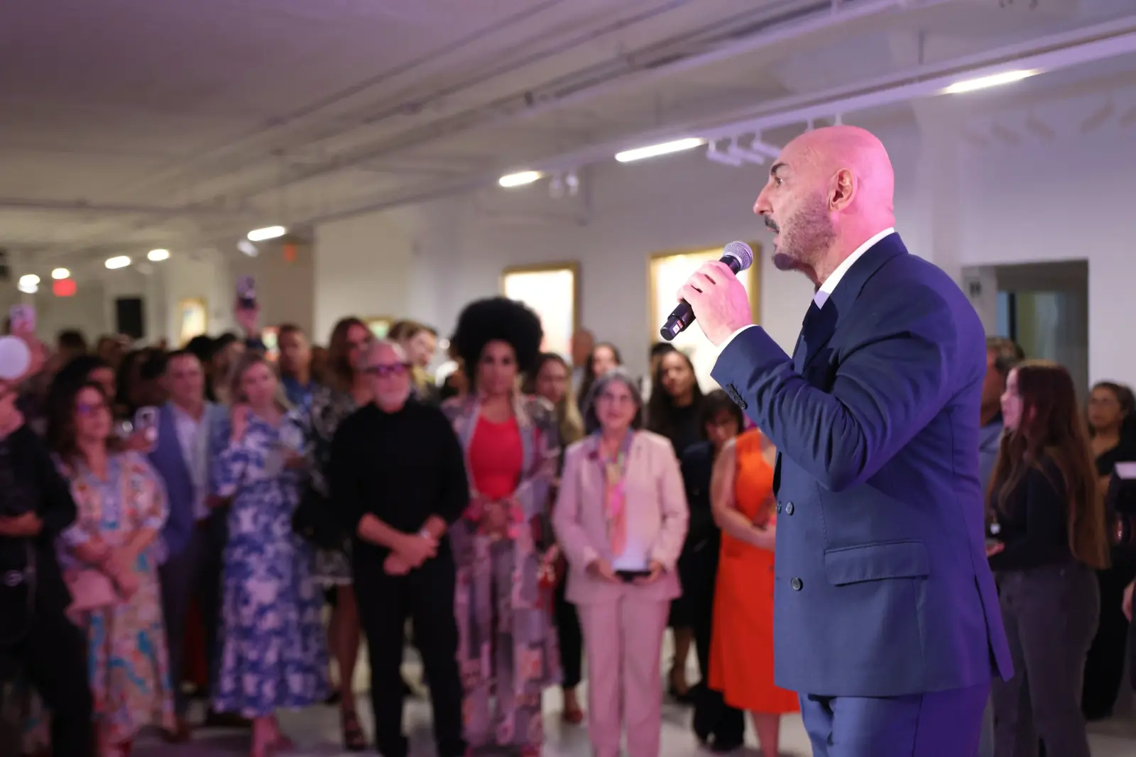 Gary Nader addressing guests at the opening of The Latin GRAMMY Collection at Gary Nader Art Centre.